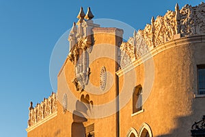 Ornate facade and rooftop of an historic Spanish renaissance style building in Santa Fe, New Mexico