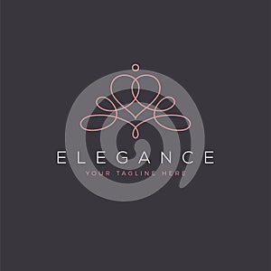 Ornate feminine elegant abstract logo with a heart shape in a modern mono line style