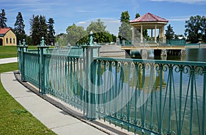 Ornate fence by lake