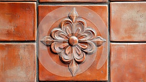 Ornate floral design on terracotta tile background