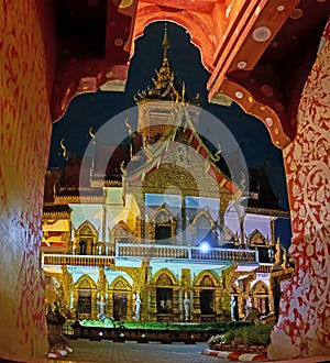 Wat Mahawan Viharn through the gateway, Chiang Mai, Thailand photo