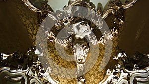 Ornate interior design with female bust