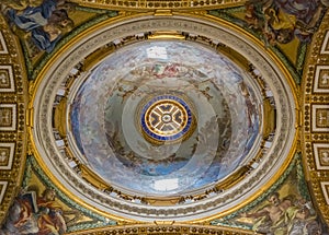 Ornate interior and a dome of Saint Peter's Basilica in Vatican