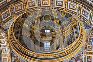 Ornate interior and a dome of Saint Peter's Basilica in Vatican