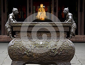 Ornate Iron Pot Liu Bei Statue photo