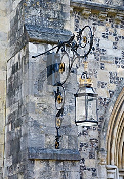 Ornate lantern on a stone wall