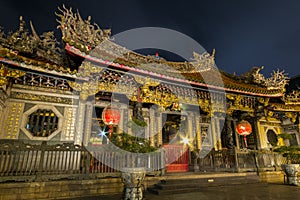 Ornate Longshan Temple at night in Taipei