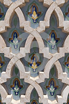 ornate masonry and tile patterns on a wall at a hassan ii mosque in casablanca