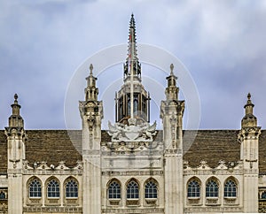 Ornate medieval gothic facade of Guildhall completed in 1440, inscription saying Lord, guide us in London, England