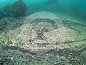 Ornate mosaic in villa protiro. Underwater archeology.