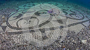 Ornate mosaic in villa protiro. Underwater archeology.