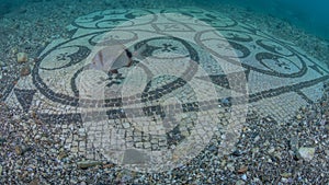 Ornate mosaic in villa protiro. Underwater archeology.