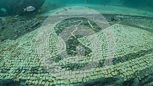 Ornate mosaic in villa protiro. Underwater archeology.