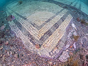 Ornate mosaic in villa protiro. Underwater archeology.