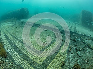 Ornate mosaic in villa protiro. Underwater archeology.