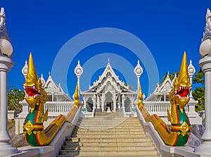 Ornate naga statues in front of the Thai Buddhist temple of Wat Kaew Korawaram in Krabi, Thailand