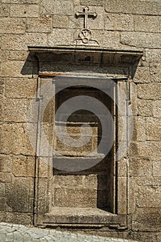 Ornate niche for statue of saint on stone wall of an old church