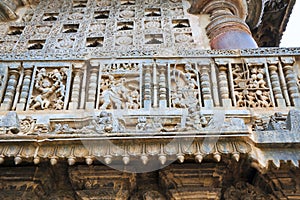 Ornate perforated window and Decorative friezes with scenes from Mahabharata at the bottom, Chennakeshava temple. Belur, Karnataka