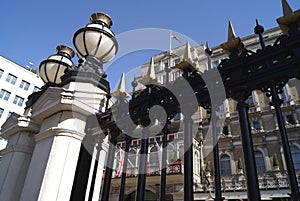 Ornate railings with lamps on lamp posts