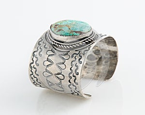 Ornate Sterling Silver Cuff bracelet with large Turquoise Stone.