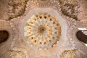 Ornate ceiling carvings in Lions patio in Alhambra palace Granada, Spain photo