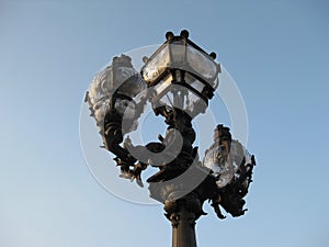 An ornate street lamp of Paris photo