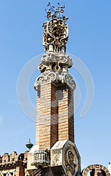 Ornate tower at the entrance of the Güell Pavilions, Pedralbes, Barcelona, Spain