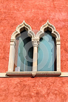 The ornate venetian-style window of the seventeenth century building Palazzo Moscardo along Via Camuzzoni, Soave photo