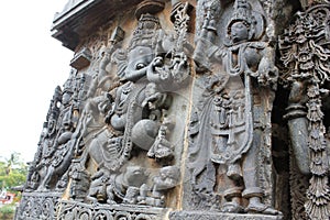 Ornate wall panel relief at Hoysaleshwara temple