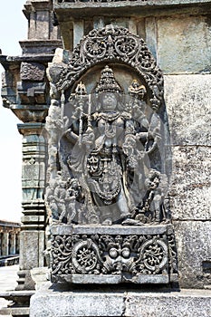 Ornate wall panel reliefs depicting Goddess Kali. Ranganayaki, Andal, temple, Chennakesava temple complex, Belur, Karnataka. West