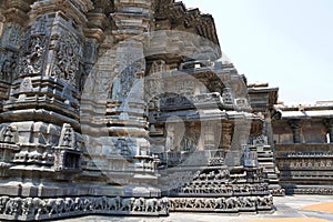 Ornate wall panel reliefs depicting Hindu deities, Chennakesava temple, Belur, Karnataka. View from West.