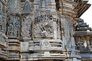Ornate wall panel reliefs depicting, from left, Sundari, Nagas, Shiva as Gajasurasamhara, Bramha and Narayana on the extre right.