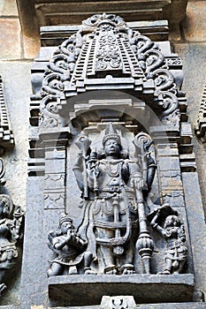 Ornate wall panel reliefs depicting Lord Vishnu, Chennakesava temple, Belur, Karnataka.
