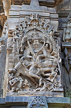 Ornate wall panel reliefs depicting Narsimha, incarnation of Vishnu, south western corner, Chennakesava temple, Belur, Karnataka,