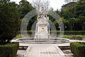 Ornate water fountain in the garden of the Marques de Pombal Palace, Oeiras, Lisbon, Portugal