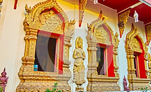 The ornate window frames of Wat Phan On, Chiang Mai, Thailand