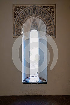 Ornate window in a palace of Alcazaba, Malaga, Spain