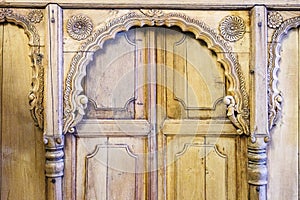 Ornate wooden door with sculpted birds, Taj Mahal Palace, Mumbai, Maharashtra, India,