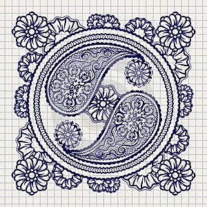 Ornate yin-yang sign on notebook background