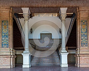 The ornately decorated stairways of the beautiful Plaza de Espana translates to Spanish Square in Seville