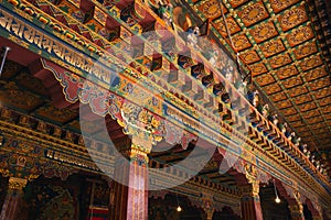 Ornately decorated Tibetan-style brackets and ceiling