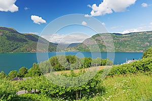 Ornes on the shore of the Lustrafjord