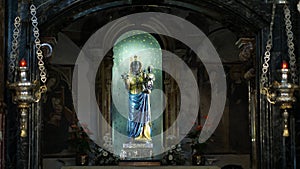 OROPA, BIELLA, ITALY - JULY 7, 2018: statue of the Mother of God on the altar in the catholic church. Shrine of Oropa