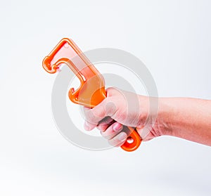 Orrange plastic pail opener on white background.-bucket opener.