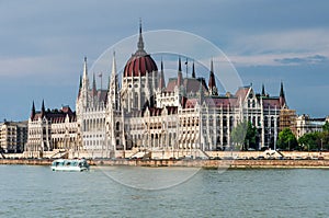 Orszaghaz Parliament in Budapest and Danube River photo