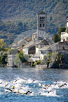 Orta San Giulio island with swimmers photo