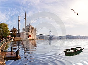 Ortakoy Mosque and the boat, beautiful view from the pier, Istanbul