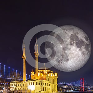 Ortakoy Mosque and Full moon. Islamic or ramadan concept image