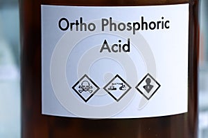 ortho phosphoric acid in bottle , chemical in the laboratory and industry photo