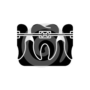 Orthodontics black glyph icon